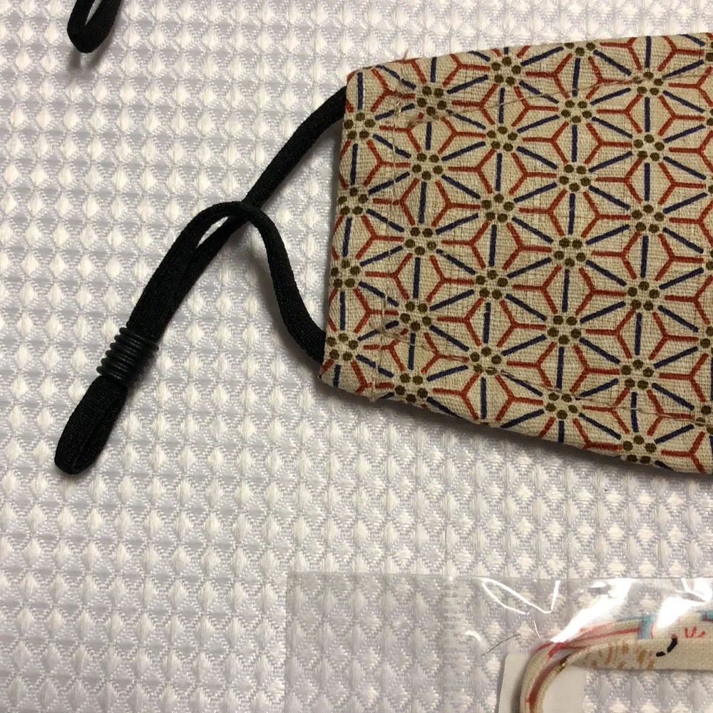 2 Masks: Tan Geometric & Black Micron Dot Elastic Bi-fold & 1 White Clip Holder